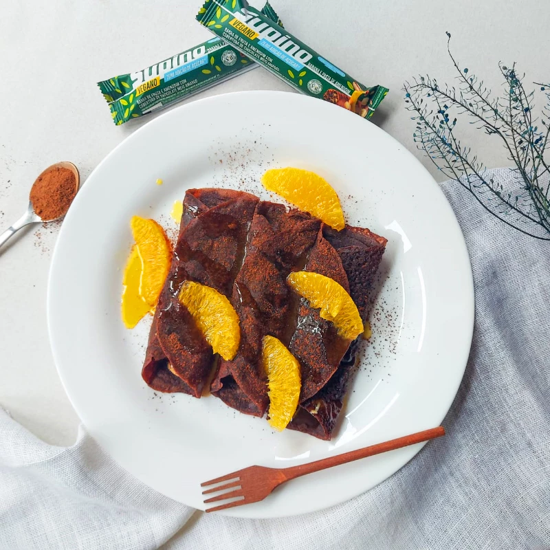 Crepe de chocolate com Supino Vegano e calda de laranja
